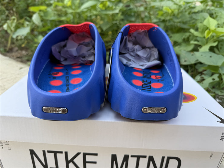 Claquettes Nike x NOCTA Alien Mule – Mules Bleu & Orange Streetwear